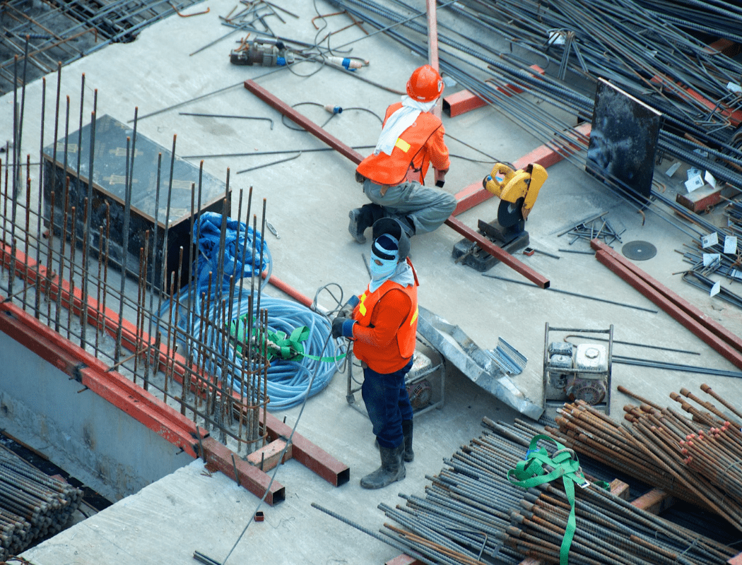 Construction workers at the site Construction workers at the site